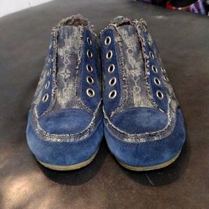 Pair of Lucky Brand slip on jean shoes
